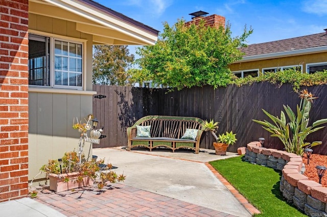 view of patio with a fenced backyard