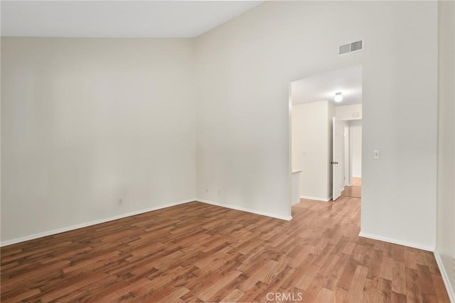 766 Harper St, Simi Valley, CA 93065 - unfurnished room featuring light wood finished floors, baseboards, and a high ceiling