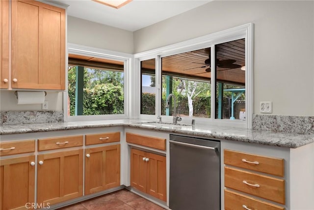 766 Harper St, Simi Valley, CA 93065 - kitchen featuring stainless steel dishwasher, light tile patterned floors, a sink, and light stone counters