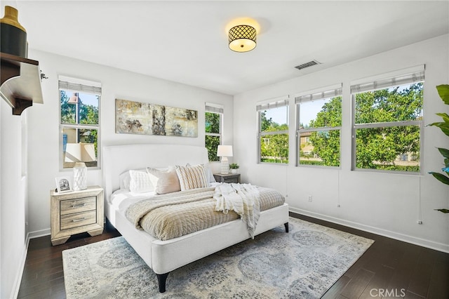 15 Clover, Lake Forest, CA 92630 - bedroom with baseboards and dark wood-type flooring