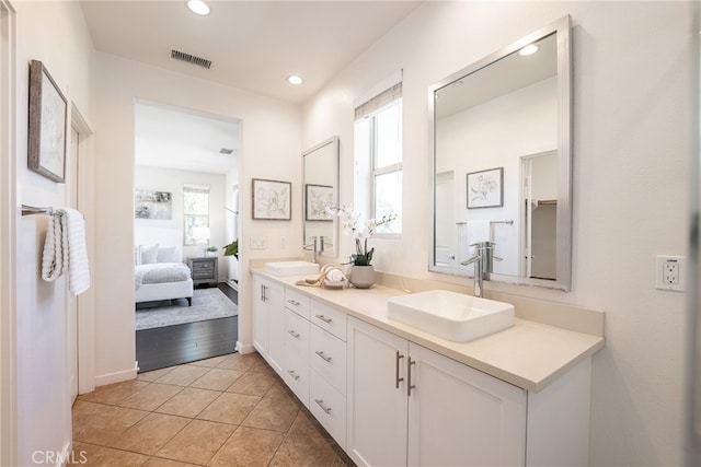 15 Clover, Lake Forest, CA 92630 - ensuite bathroom with double vanity, tile patterned floors, and recessed lighting