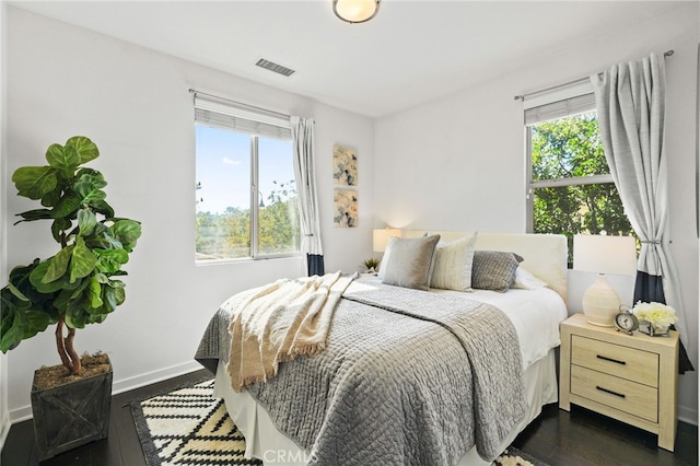 15 Clover, Lake Forest, CA 92630 - bedroom featuring dark wood-style flooring and baseboards