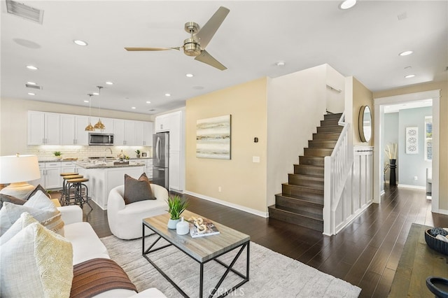 15 Clover, Lake Forest, CA 92630 - living area featuring baseboards, stairs, dark wood-style flooring, ceiling fan, and recessed lighting