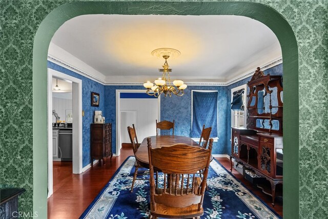 9438 Burnet Ave, North Hills, CA 91343 - dining room with arched walkways and wallpapered walls