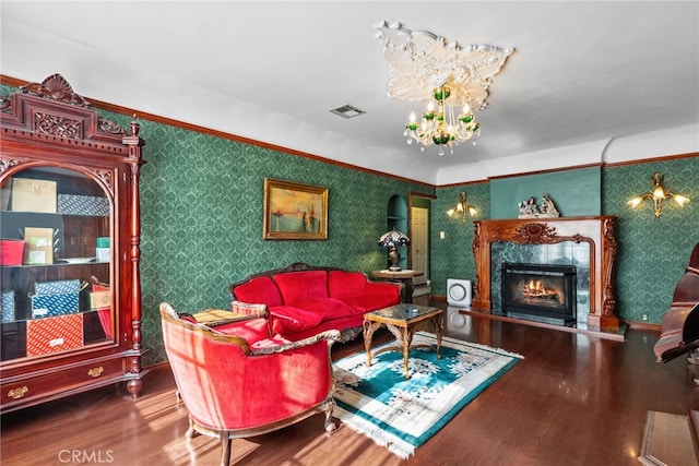 9438 Burnet Ave, North Hills, CA 91343 - living area featuring wood finished floors, a chandelier, and wallpapered walls