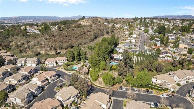 birds eye view of property with a residential view and a mountain view