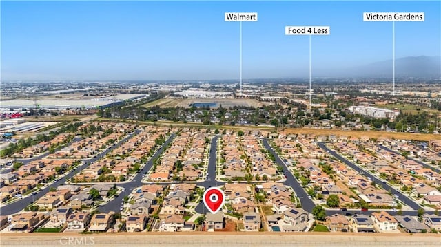 aerial view of residential area with a mountainous background