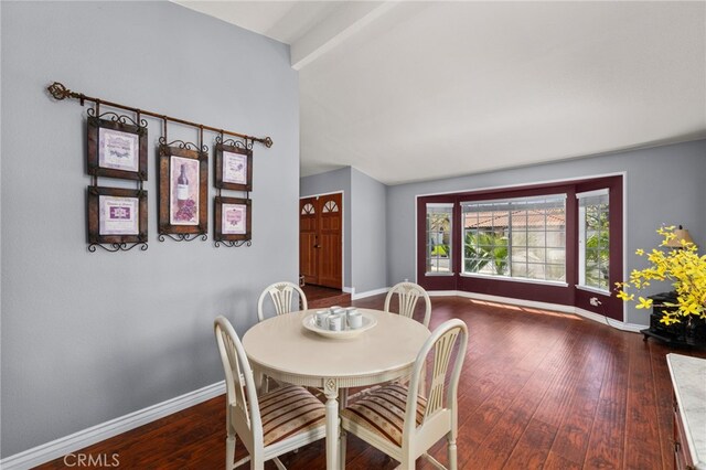 11820 Mount Wilson Ct, Rancho Cucamonga, CA 91737 - dining room with baseboards, dark wood-style flooring, and lofted ceiling