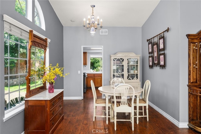 11820 Mount Wilson Ct, Rancho Cucamonga, CA 91737 - dining space featuring baseboards, an inviting chandelier, dark wood finished floors, and visible vents