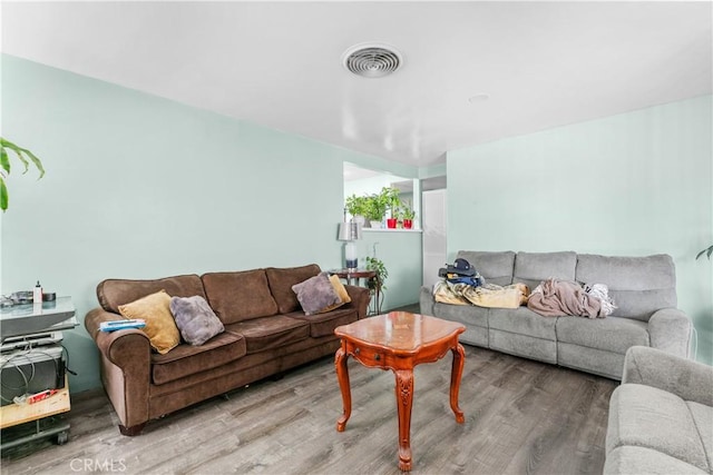 12036 Jouett St, Sylmar, CA 91342 - living area featuring wood finished floors