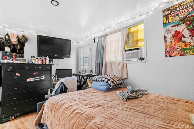 12036 Jouett St, Sylmar, CA 91342 - bedroom with wood finished floors and cooling unit