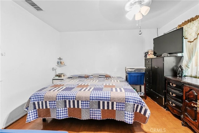 12036 Jouett St, Sylmar, CA 91342 - bedroom with light wood finished floors and a ceiling fan