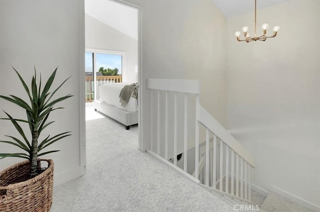 413 Avenida Adobe, San Clemente, CA 92672 - corridor featuring an upstairs landing, carpet flooring, a chandelier, and lofted ceiling