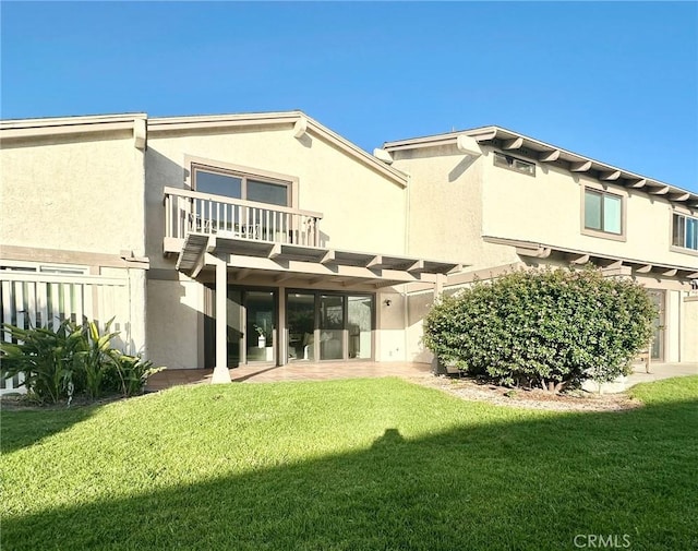 413 Avenida Adobe, San Clemente, CA 92672 - rear view of property featuring a balcony, a yard, and stucco siding