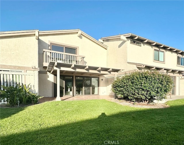 413 Avenida Adobe, San Clemente, CA 92672 - back of property featuring a balcony, a yard, and stucco siding
