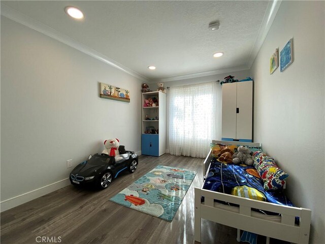 22272 Redwood Pointe Unit 5C, Lake Forest, CA 92630 - rec room featuring crown molding, wood finished floors, baseboards, recessed lighting, and a textured ceiling