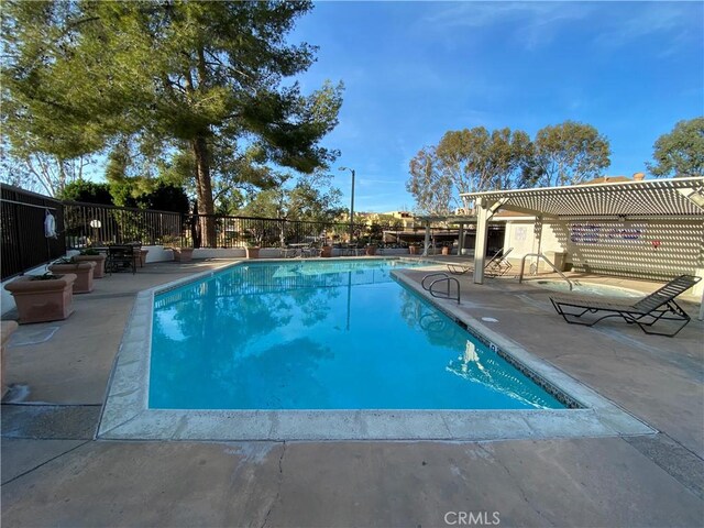 22272 Redwood Pointe Unit 5C, Lake Forest, CA 92630 - community pool with a patio area and fence