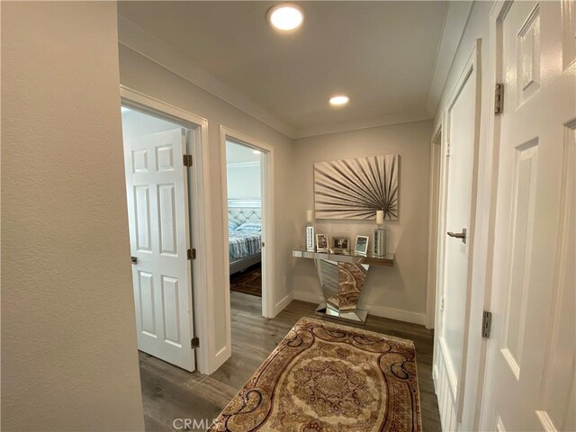 22272 Redwood Pointe Unit 5C, Lake Forest, CA 92630 - hall with dark wood-style floors, recessed lighting, baseboards, and ornamental molding