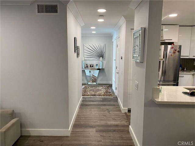 22272 Redwood Pointe Unit 5C, Lake Forest, CA 92630 - corridor featuring dark wood-type flooring, ornamental molding, baseboards, and recessed lighting