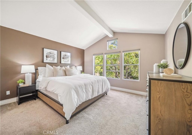 bedroom featuring baseboards and light colored carpet