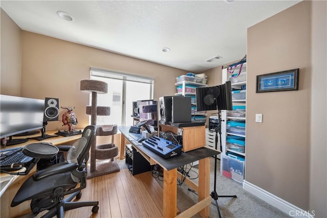 office space with baseboards