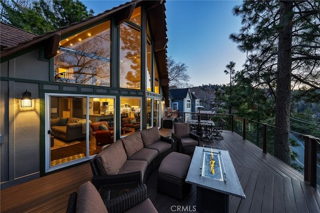 27550 N Bay Rd, Lake Arrowhead, CA 92352 - wooden deck with an outdoor living space with a fire pit and outdoor dining space
