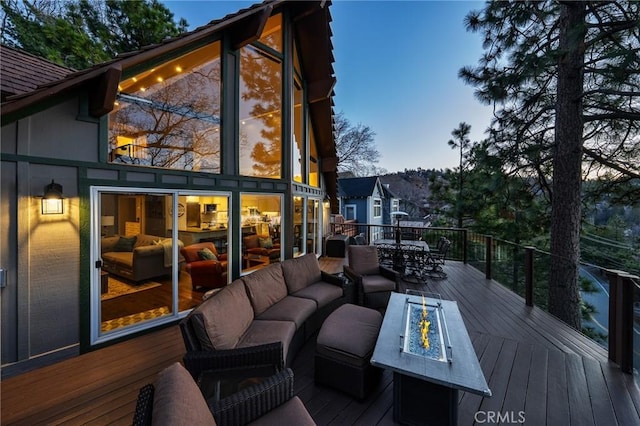 27550 N Bay Rd, Lake Arrowhead, CA 92352 - deck with an outdoor living space with a fire pit and outdoor dining area