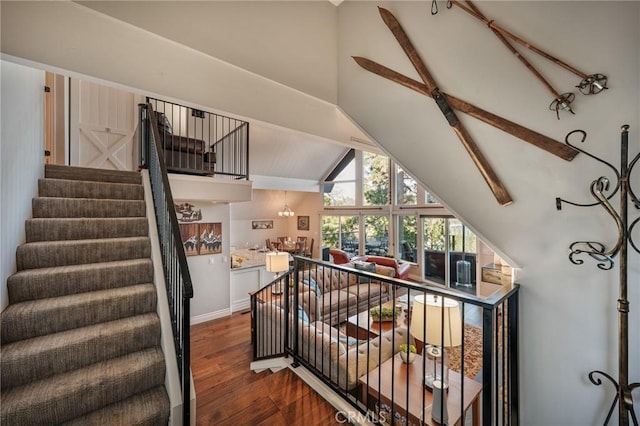 27550 N Bay Rd, Lake Arrowhead, CA 92352 - staircase featuring wood finished floors, beam ceiling, and high vaulted ceiling