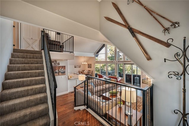 27550 N Bay Rd, Lake Arrowhead, CA 92352 - staircase featuring wood finished floors, beamed ceiling, and high vaulted ceiling