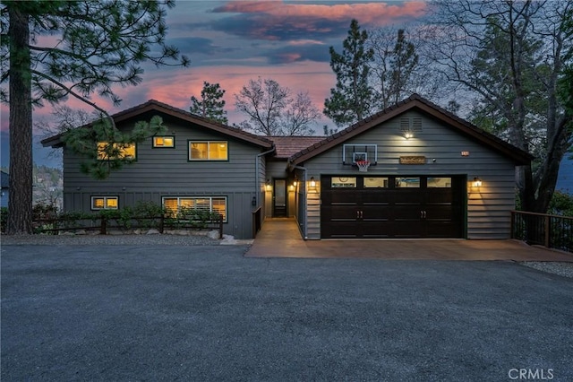 27550 N Bay Rd, Lake Arrowhead, CA 92352 - view of front of house featuring asphalt driveway and an attached garage