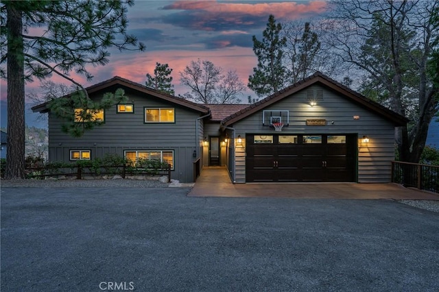 27550 N Bay Rd, Lake Arrowhead, CA 92352 - view of front of property with asphalt driveway and a garage