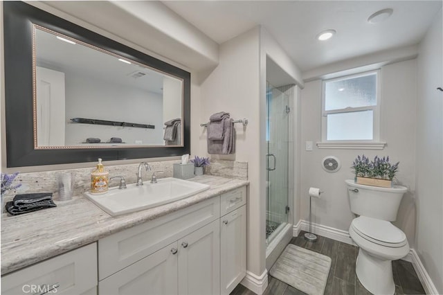 27550 N Bay Rd, Lake Arrowhead, CA 92352 - bathroom with vanity, a shower stall, and wood finished floors