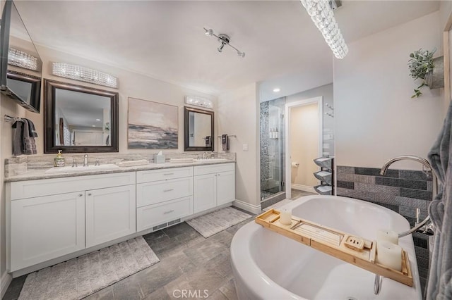 27550 N Bay Rd, Lake Arrowhead, CA 92352 - full bathroom featuring a stall shower, a garden tub, double vanity, and recessed lighting