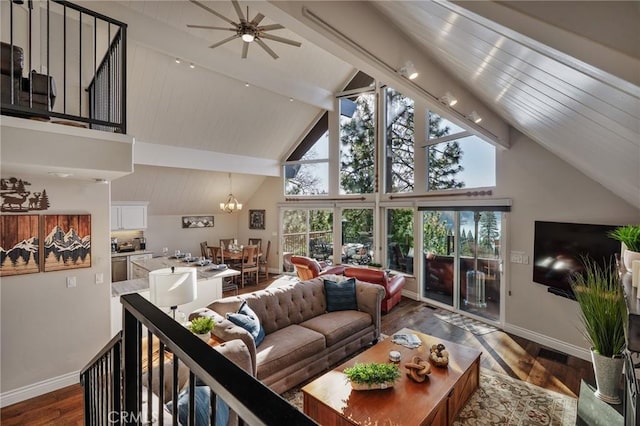 27550 N Bay Rd, Lake Arrowhead, CA 92352 - living room featuring high vaulted ceiling, baseboards, beamed ceiling, dark wood-style floors, and a chandelier