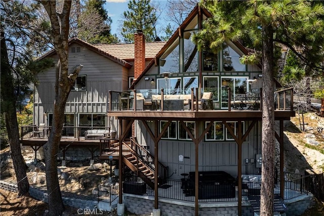 27550 N Bay Rd, Lake Arrowhead, CA 92352 - back of property with a deck, a chimney, and stairway