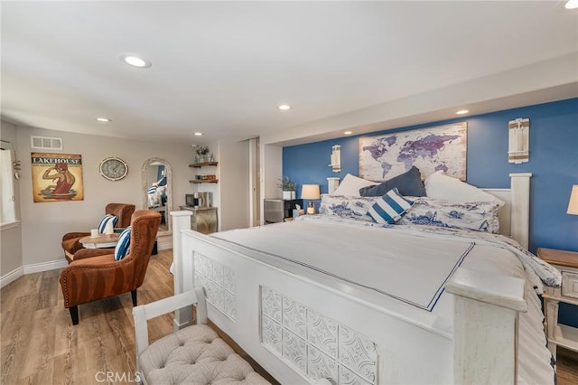 27550 N Bay Rd, Lake Arrowhead, CA 92352 - bedroom with wood finished floors, recessed lighting, and baseboards