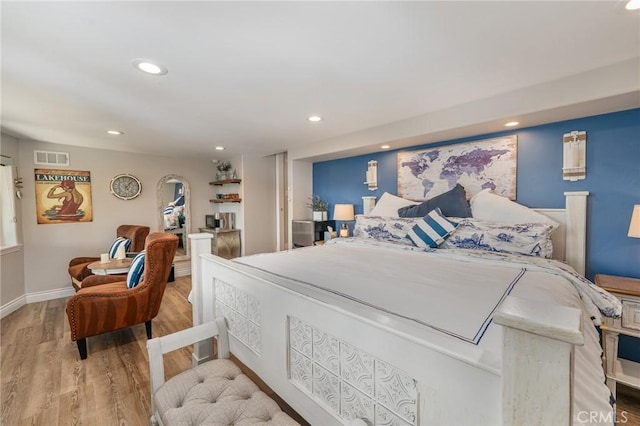 27550 N Bay Rd, Lake Arrowhead, CA 92352 - bedroom with wood finished floors and recessed lighting