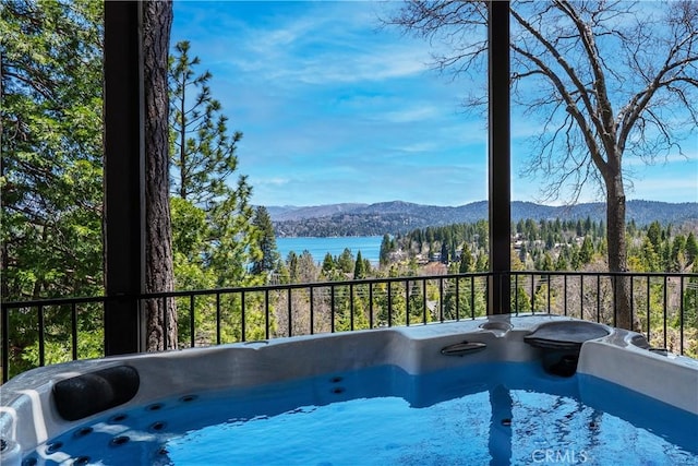 27550 N Bay Rd, Lake Arrowhead, CA 92352 - view of swimming pool with a water and mountain view and a hot tub