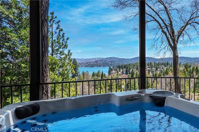 27550 N Bay Rd, Lake Arrowhead, CA 92352 - view of swimming pool with a water and mountain view and a hot tub