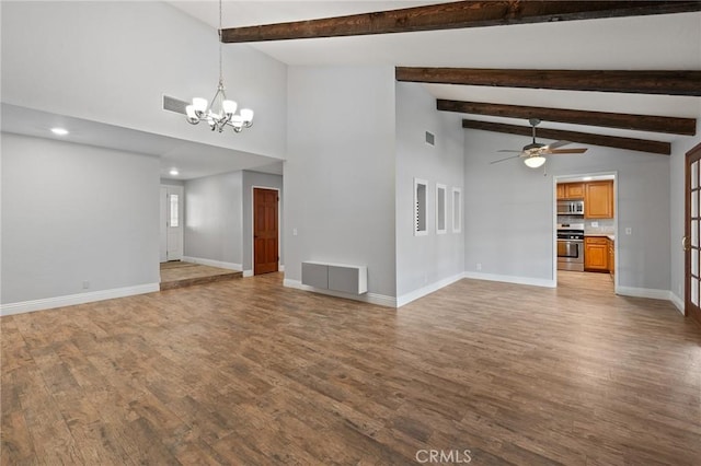 unfurnished living room featuring light wood-style floors, ceiling fan with notable chandelier, baseboards, beamed ceiling, and visible vents
