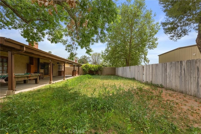view of yard with a fenced backyard and a patio area