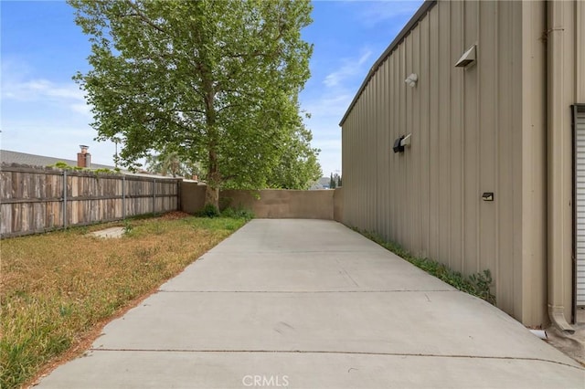 exterior space featuring a fenced backyard
