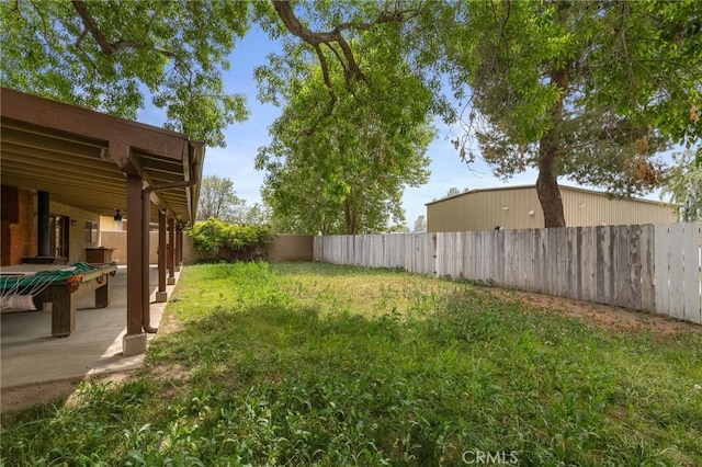 view of yard featuring a fenced backyard and a patio area