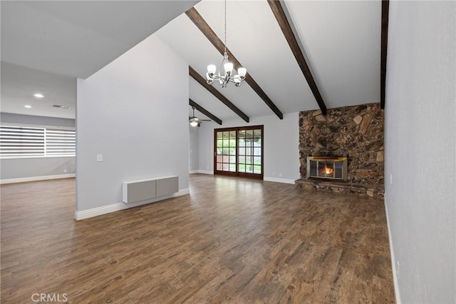 unfurnished living room with vaulted ceiling with beams, a notable chandelier, wood finished floors, and a fireplace