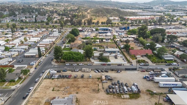 drone / aerial view featuring a mountain view