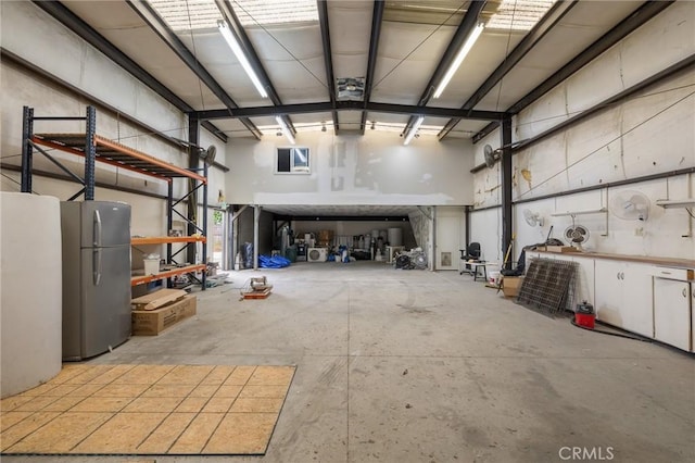 garage featuring freestanding refrigerator
