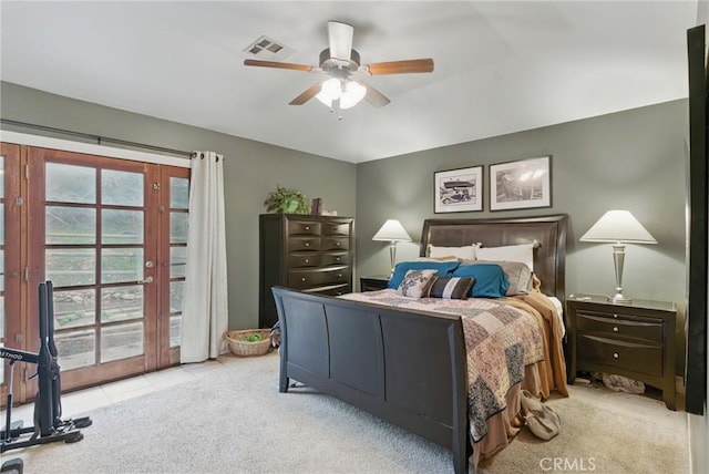 bedroom with a ceiling fan, access to exterior, visible vents, light carpet, and light tile patterned flooring