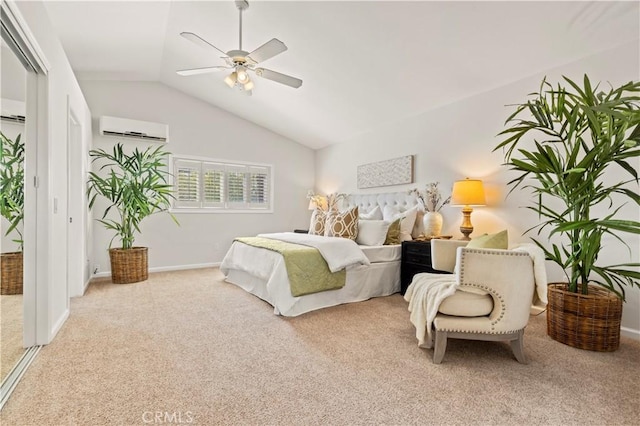 bedroom with carpet floors, lofted ceiling, baseboards, a wall mounted AC, and a ceiling fan