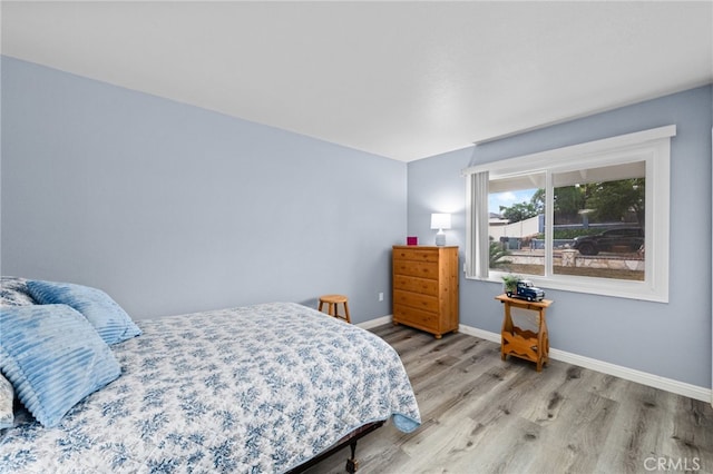 1530 Greenbriar Ave, Corona, CA 92878 - bedroom featuring light wood finished floors and baseboards