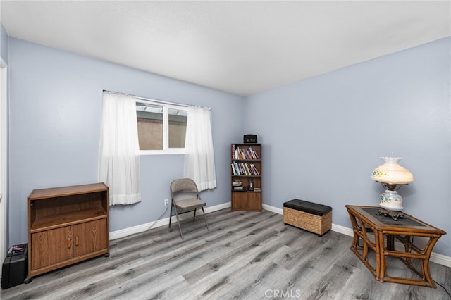 1530 Greenbriar Ave, Corona, CA 92878 - sitting room featuring wood finished floors and baseboards
